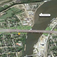 Aerial map view of highway interchange crossing a river with residential neighborhoods and Interstate 80 marked