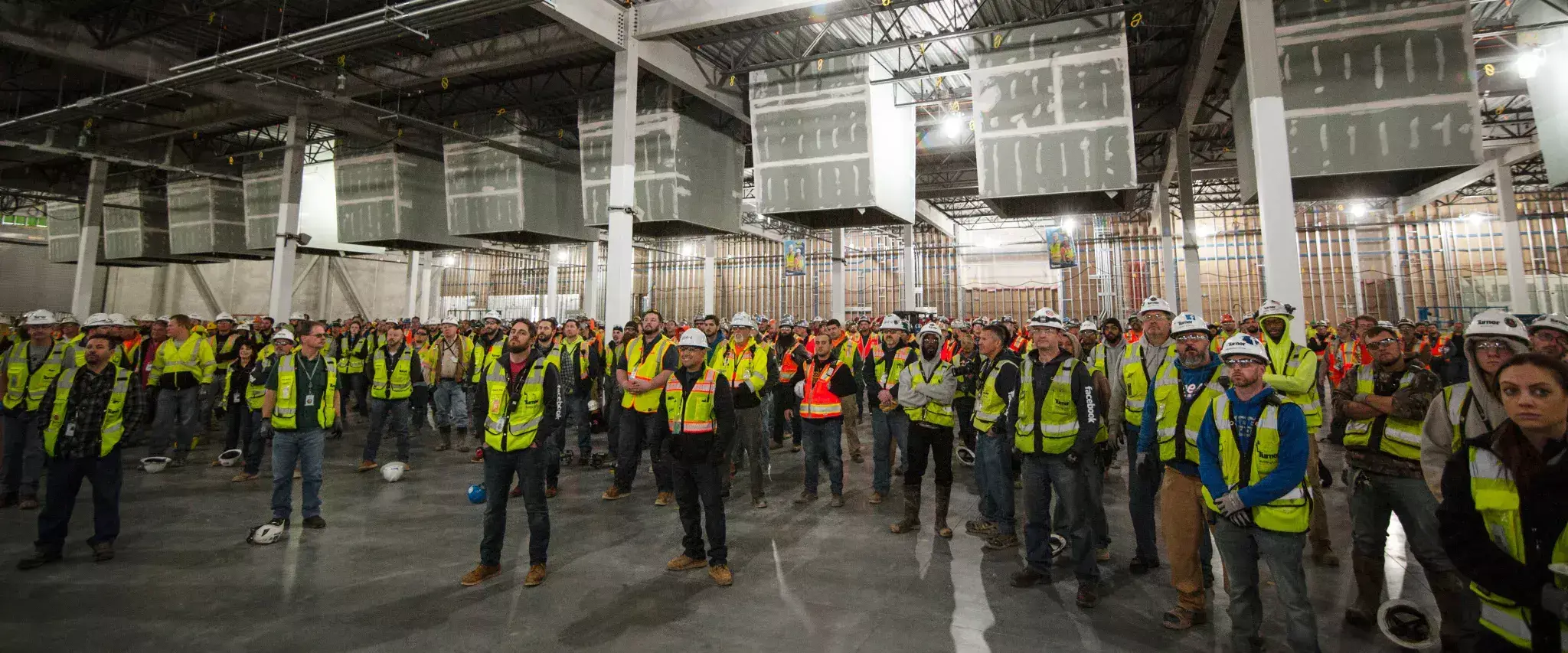 Construction workers inside a Meta data center