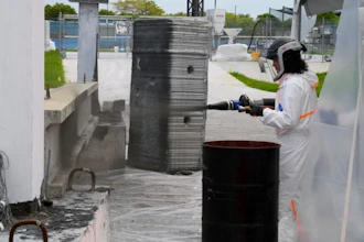 FIU Professor Atorod Azizinamini demonstrates application of Sprayable Ultra-High Performance Concrete.