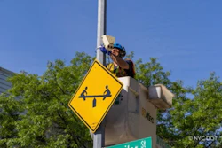 NYC DOT Traffic Operations worker installing a new Viva activity sensor in Greenpoint, Brooklyn.