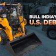 Yellow BULL skid steer loader with bucket attachment on industrial construction site announcing Bull India's U.S. market debut