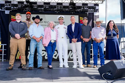 From left, Joseph Santry; Justin Butts; Jeff Morrison; Jeanette Lombardo, CEO of the Farmer Veteran Coalition; U.S. Navy Capt. Loren Jacobi, commanding officer of Naval Base Coronado; Alex Woods. president, Kubota Tractor; Hudson Grigg; Keelan Brown.