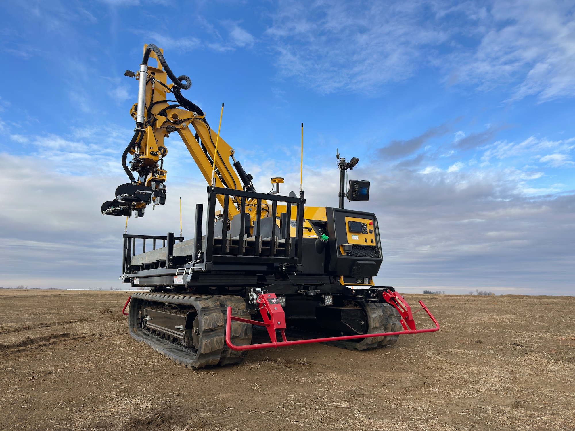 The MT500 material transporter is made specifically for moving W-beam piles on solar farm jobsites.