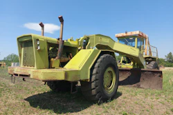 The Heavy Construction Heritage Society's rare 1970s RayGo Giant motor grader runs on two 318-horsepower Detroit diesels, front and back, and weighs over 50 tons.