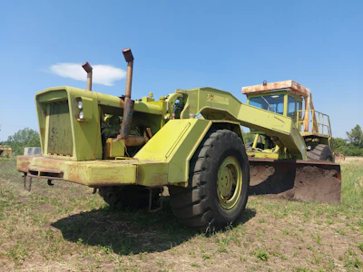 The Heavy Construction Heritage Society's rare 1970s RayGo Giant motor grader runs on two 318-horsepower Detroit diesels, front and back, and weighs over 50 tons.