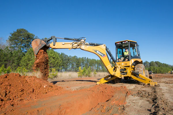 Sany's new BHL95 backhoe gets a telescopic arm for 3 more feet of dig depth and reach.
