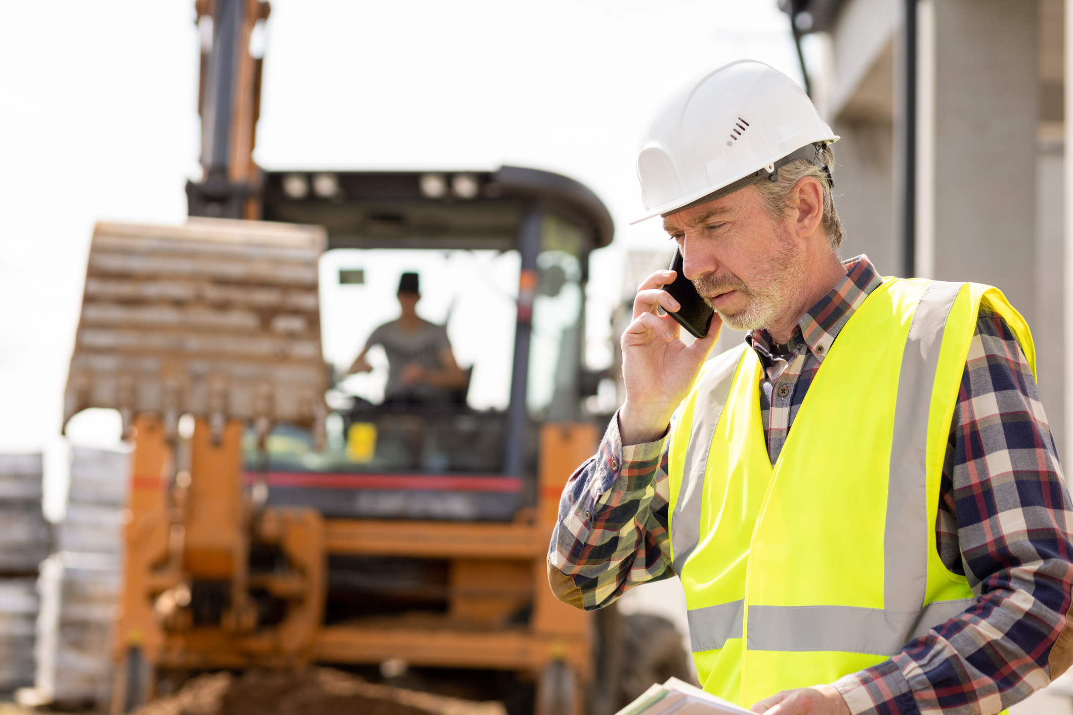 Contractor On Phone Getty Images 1411653723