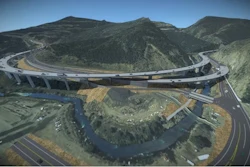 A rendering of the future I-70 Floyd Hill Project I-70 alignment looking south, with westbound I-70 braiding over eastbound I-70 at the bottom of Floyd Hill.