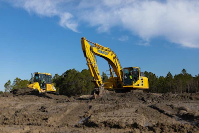 Representative image of a Komatsu hydraulic excavator and dozer. Equipment shown is for illustrative purposes only and does not depict machines that have been retrofitted.