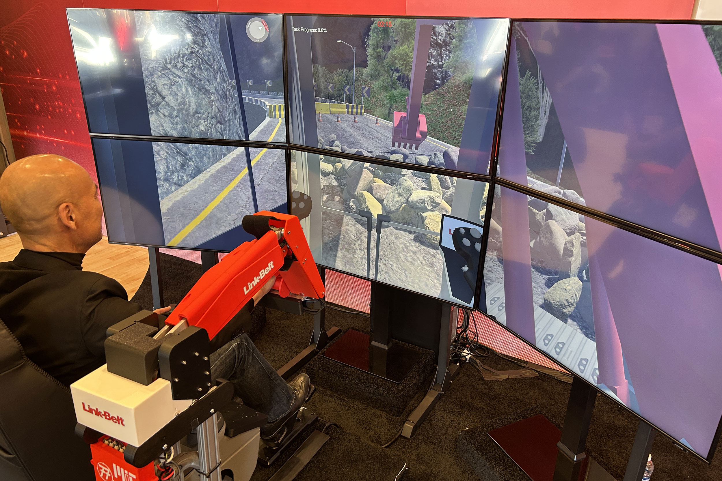 MIT's excavator training simulator uses a mechanical arm instead of joysticks.
