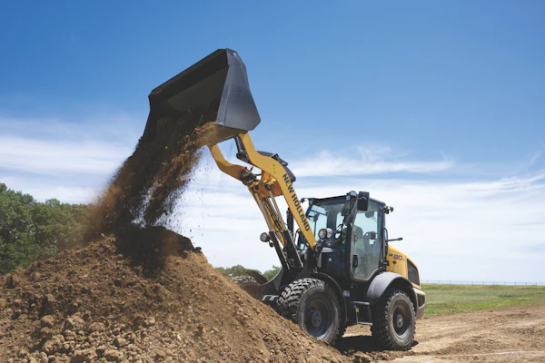 New Holland's new W80D compact wheel loader comes in standard and a long-reach configuration with an extra foot of hinge pin height.
