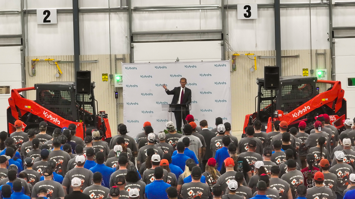 David Disberger, president and CEO of Kubota's Great Plains Manufacturing, speaks to employees at the celebration of the new SVL75-3 assembly line in Salina, Kansas.