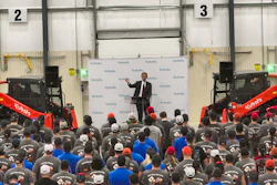 David Disberger, president and CEO of Kubota's Great Plains Manufacturing, speaks to employees at the celebration of the new SVL75-3 assembly line in Salina, Kansas.