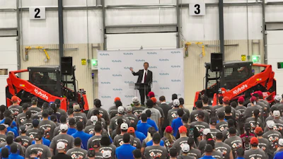 David Disberger, president and CEO of Kubota's Great Plains Manufacturing, speaks to employees at the celebration of the new SVL75-3 assembly line in Salina, Kansas.