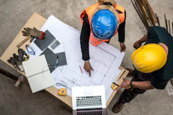 Contractors Looking At Plans