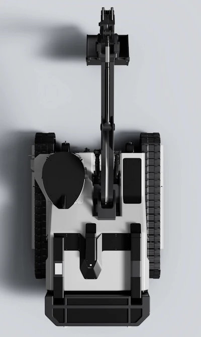 Top-down view of a black and white Lumina Bladerunner excavator with tracked treads and articulated mechanical arms