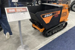 SCAG 2500 tracked dump buggy on display at trade show with product information sign
