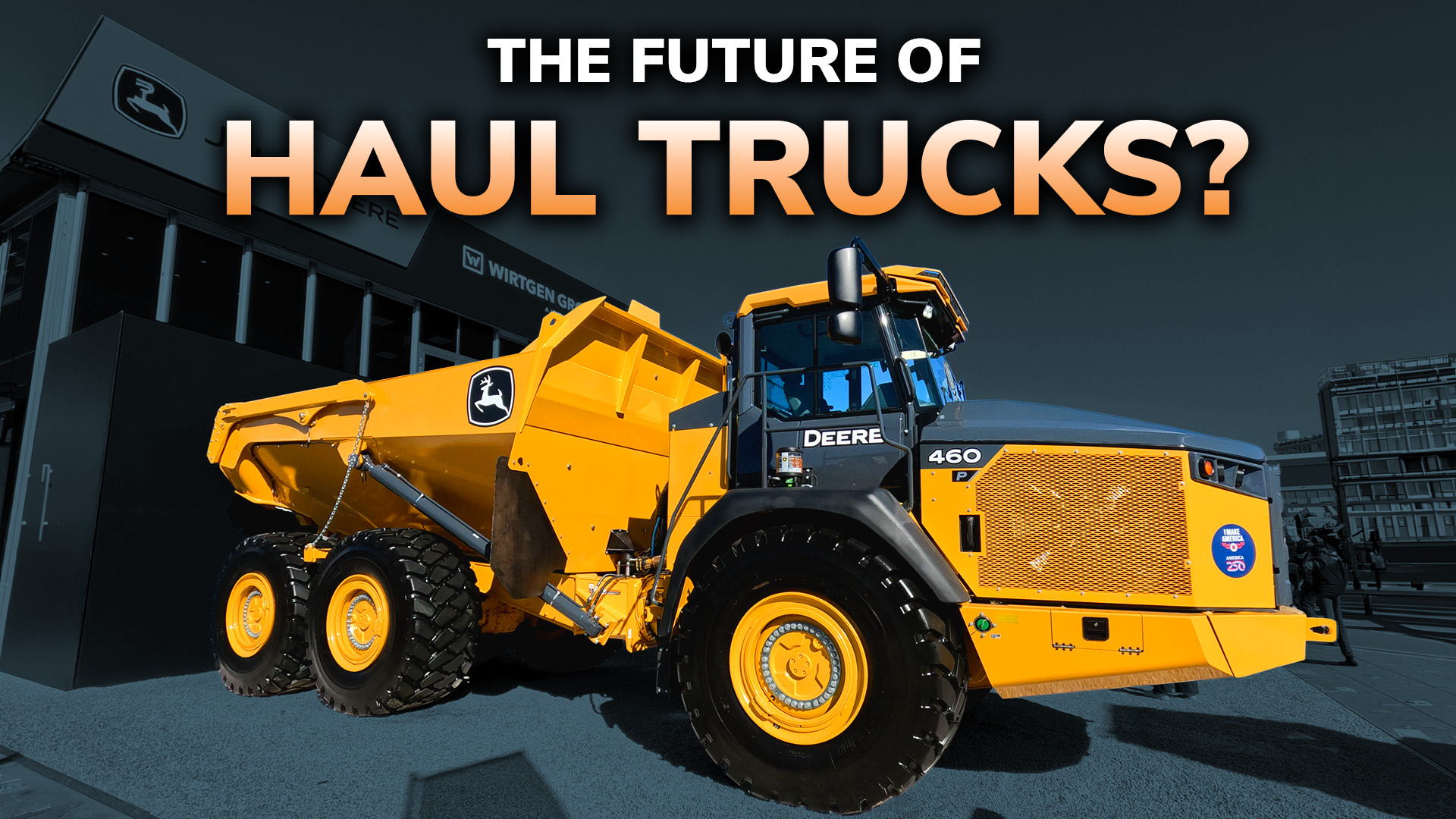Yellow and black John Deere articulated dump truck with 460 capacity in urban setting