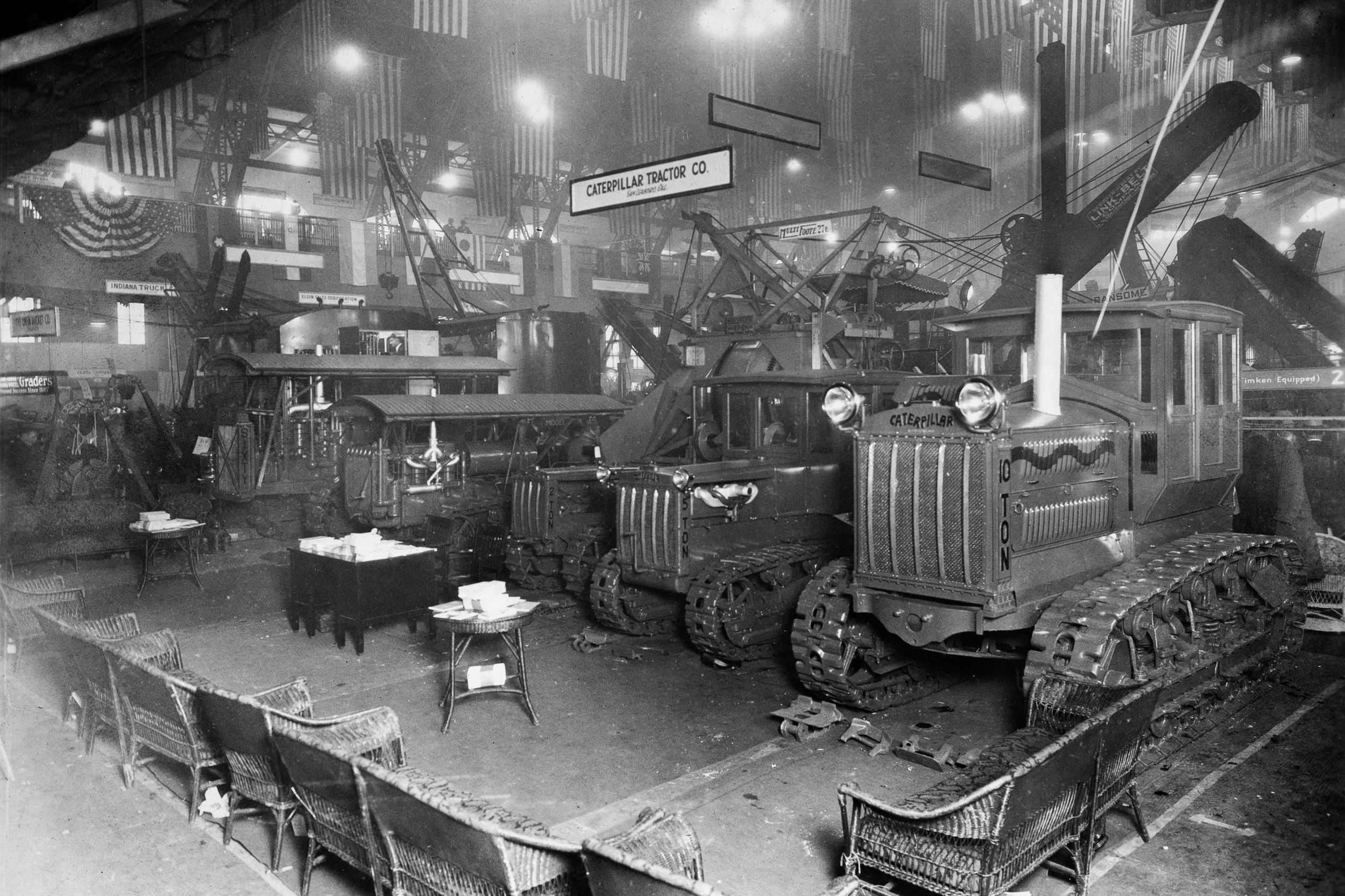 Historical factory floor with tracked industrial machinery and equipment at Caterpillar Tractor Company facility