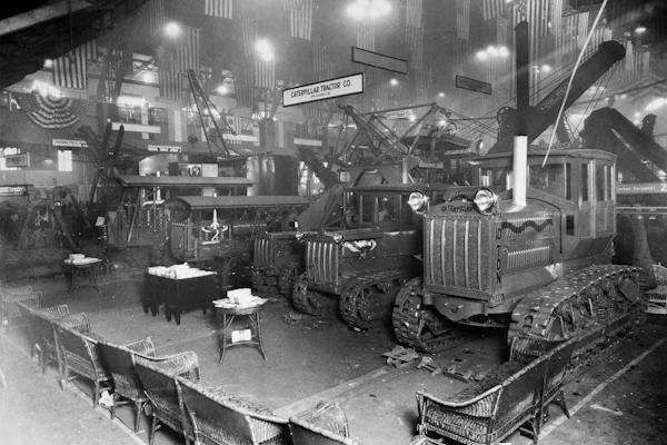 Historical factory floor with tracked industrial machinery and equipment at Caterpillar Tractor Company facility