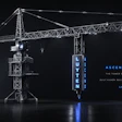 Luyten Ascend Series tower crane 3D printer with blue illumination against dark background