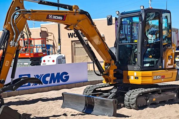 Yellow XCMG 4.8-metric-ton XE45U Pro mini excavator with hydraulic arm and bucket displayed at ConExpo 2026