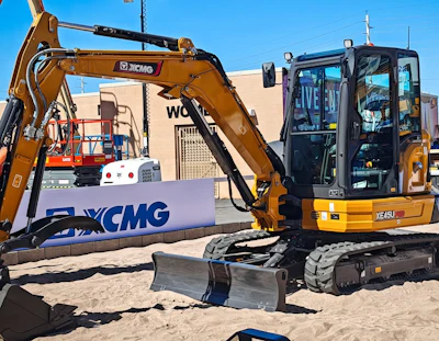 Yellow XCMG 4.8-metric-ton XE45U Pro mini excavator with hydraulic arm and bucket displayed at ConExpo 2026